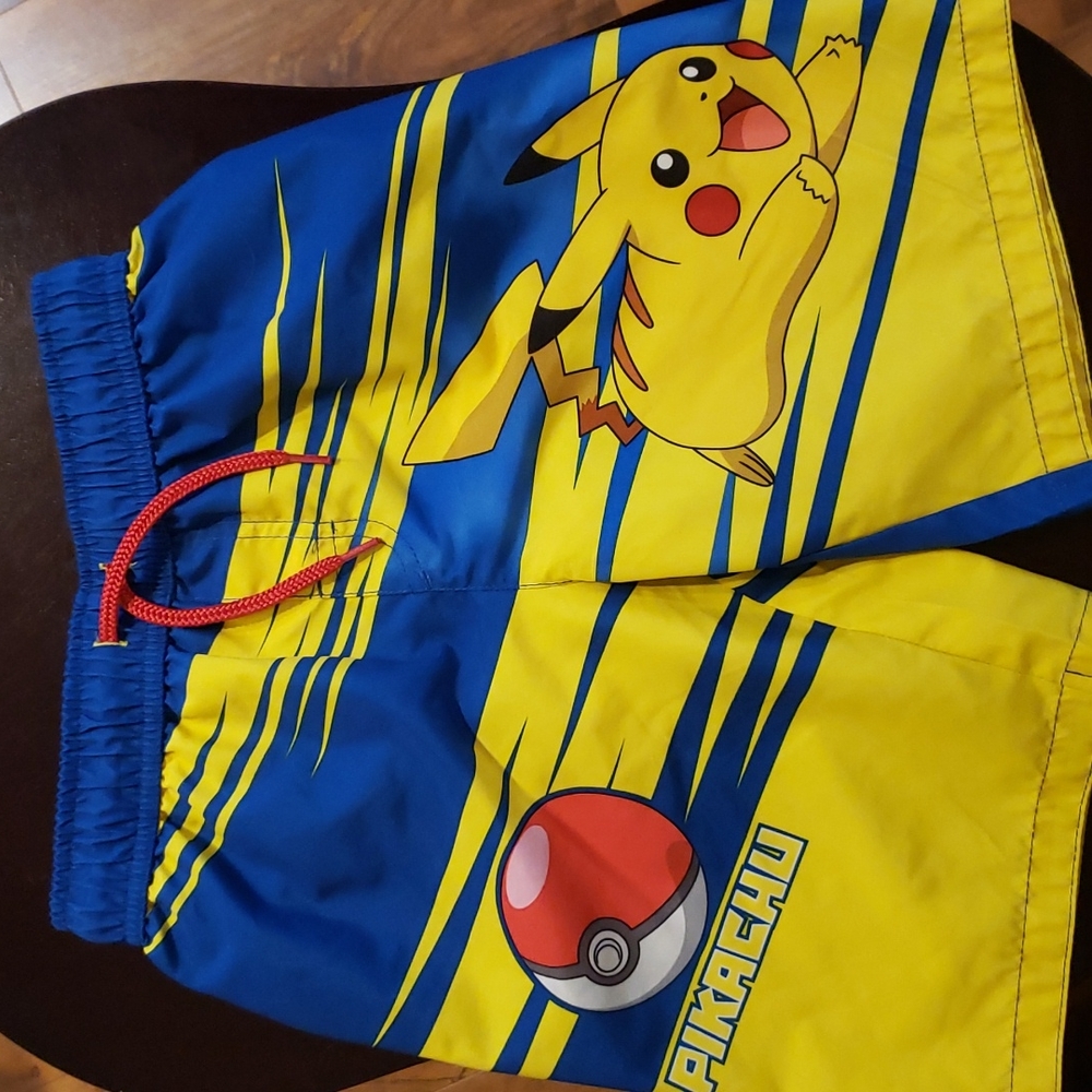 Pokémon Pikachu swim trunks board shorts. Size 7